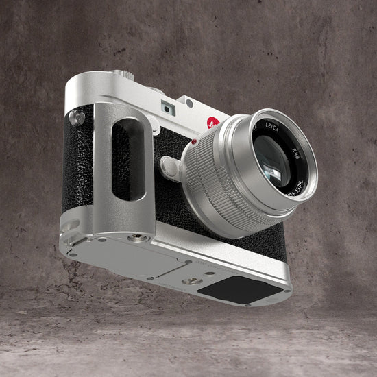 Silver Chrome FlexGrip fitted to a Leica M10, seen at three quarters with the lens forward