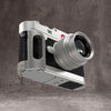 Silver Chrome FlexGrip fitted to a Leica M10, seen at three quarters with the lens forward