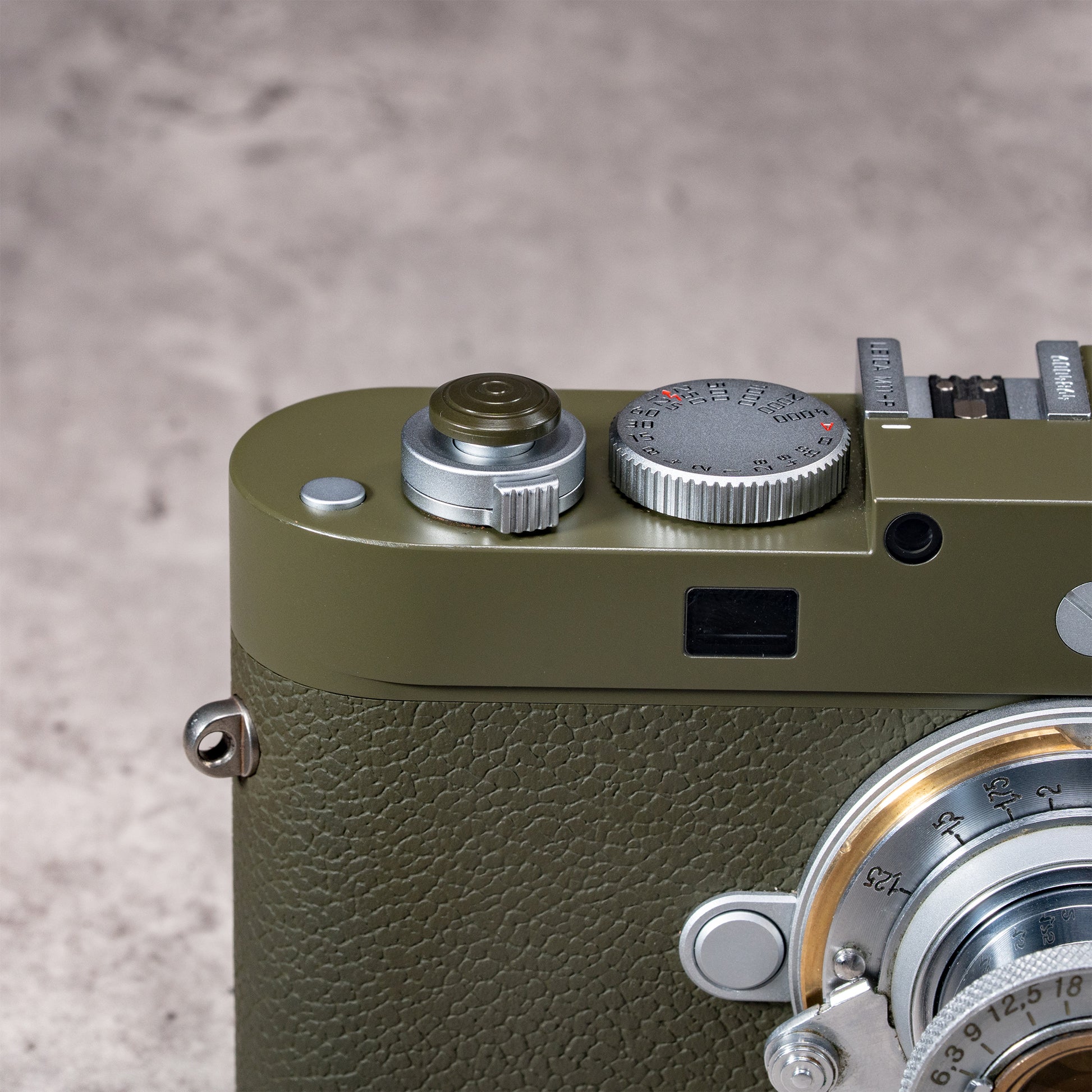 Safari Shutter Topper on an olive Leica M with a silver lens