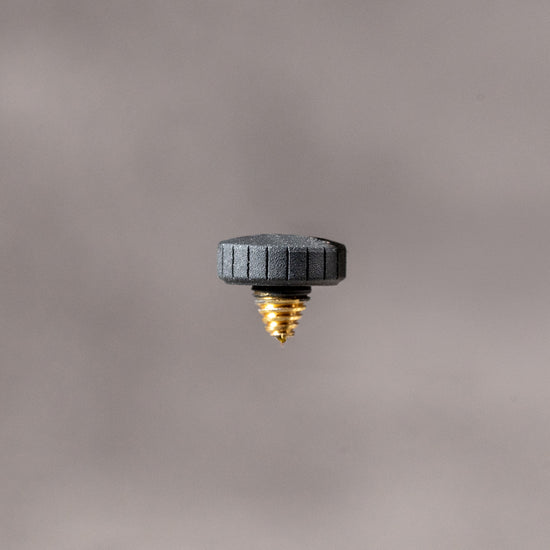 Owlkrown Shutter Topper in Black Cerakote showing the knurled edge and solid brass thread, 7.25 mm