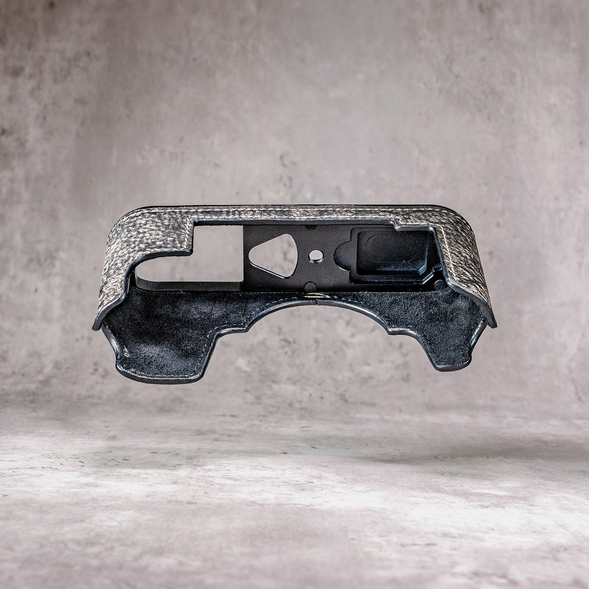 The interior of the Buffalo SlimCase with the base plate and the SD card slot