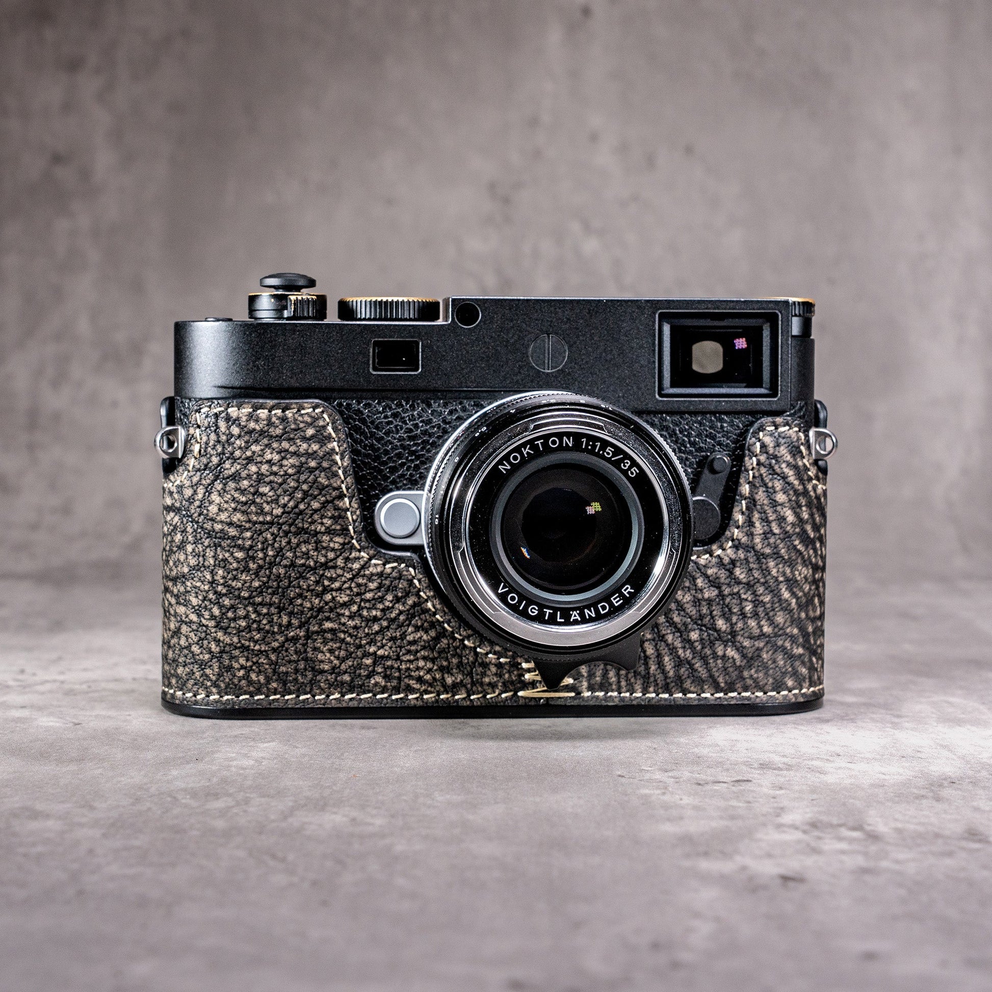 A Leica M11 in the Buffalo SlimCase, photographed from the front