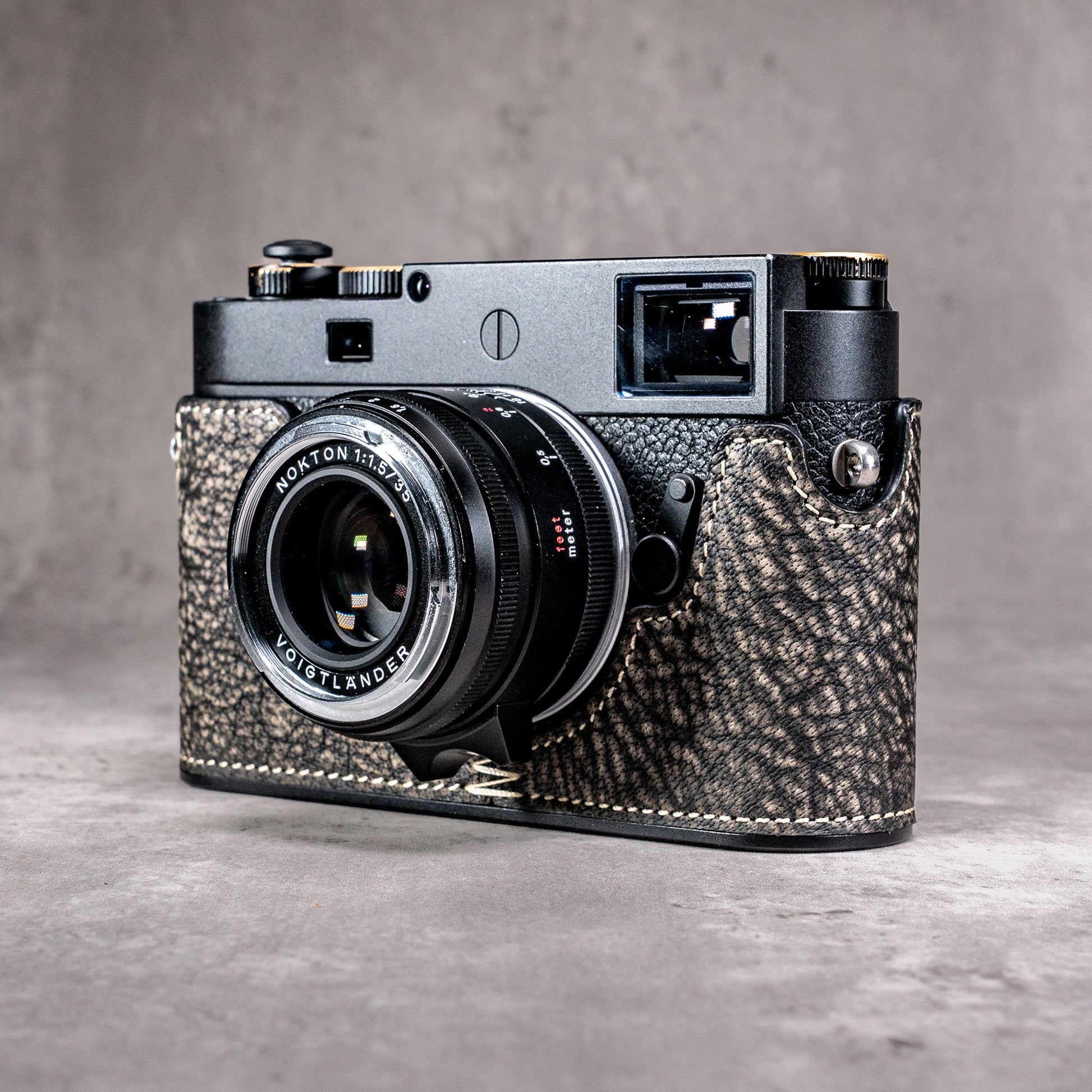 A Leica M11 in the Buffalo SlimCase with the lens focused close
