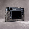 The back of the camera at an angle, showing the controls left uncovered