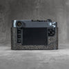 The back of a Leica M11 in the Buffalo SlimCase, straight on, with the screen uncovered