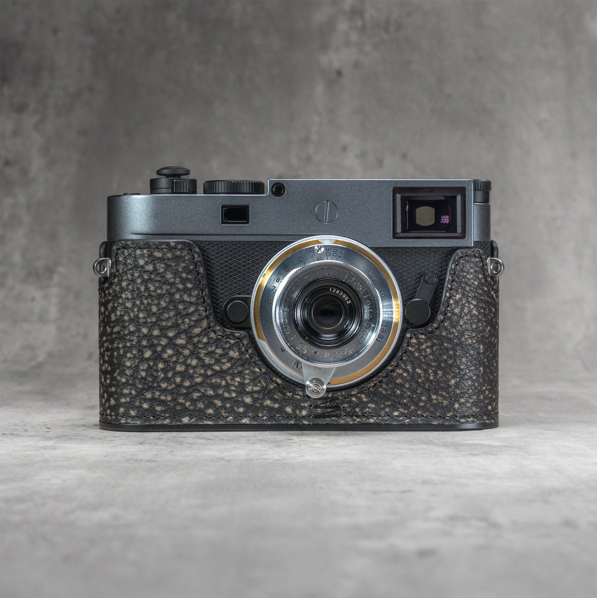 A Leica M11 in the Buffalo SlimCase photographed straight on from the front