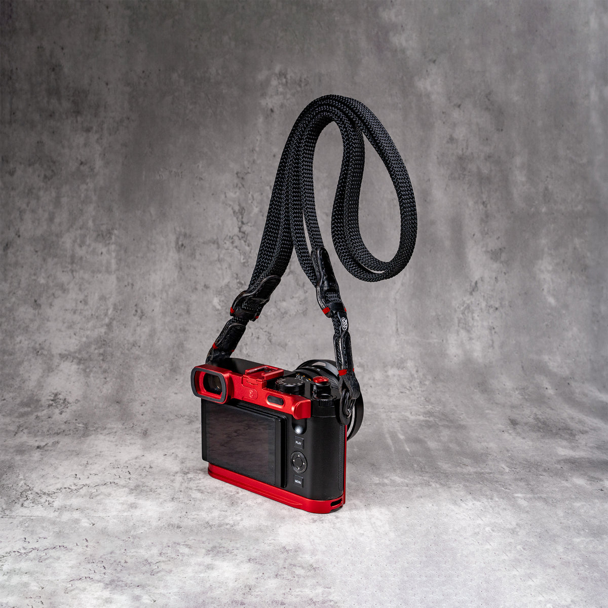 Travel Kit for Leica Q2 and Q3 in OxBlood, fitted to the camera