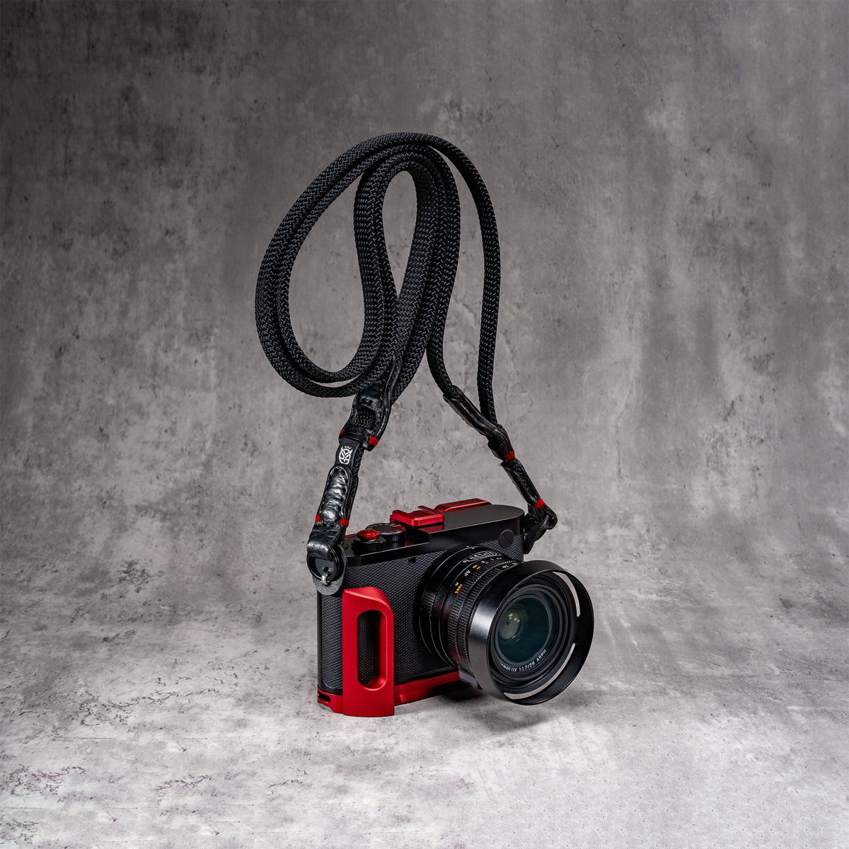 Travel Kit for Leica Q2 and Q3 in OxBlood, camera on the strap