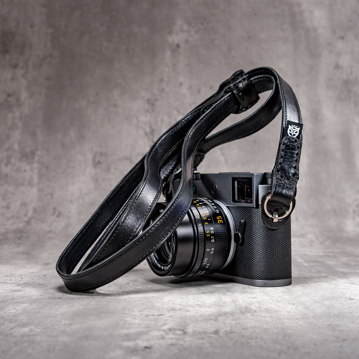 Trailflex Leather strap in Stealth draped over a Leica M