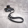 Trailflex Leather strap in Stealth at full length, attached to a Leica M