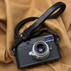 Trailflex Leather strap in Black with Red Accent on a Leica M with a silver lens