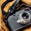 Trailflex Leather strap ends with red stitching and polished split rings