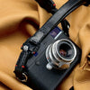 Tuscany Italian leather body of the Trailflex Leather strap across a Leica M