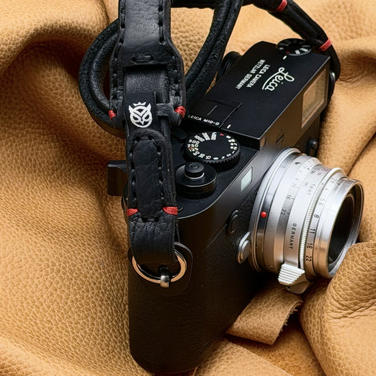Trailflex Leather strap end with Owlkrown logo and red stitching on a Leica M