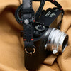 Trailflex Leather strap end with Owlkrown logo and red stitching on a Leica M
