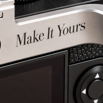 Make It Yours engraved on a camera thumb grip