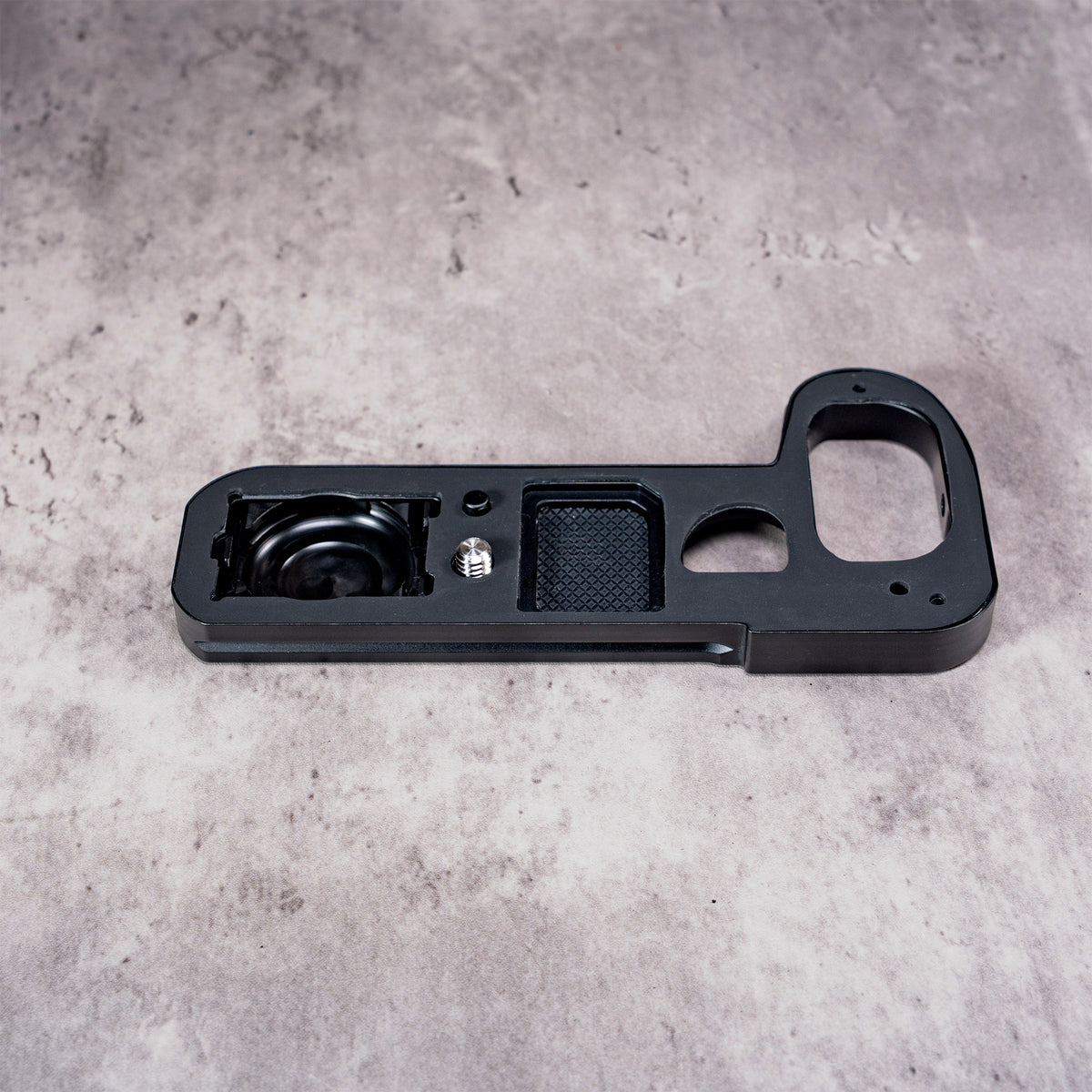 Owlkrown FlexPlate for Leica SL3 with the concealed AirTag compartment and internal card bay in view