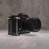 Leica SL3 with the Owlkrown FlexPlate fitted, three quarter view from the front left
