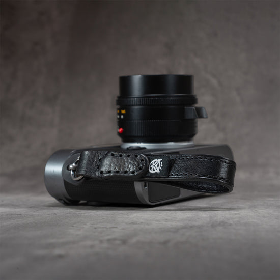Leather Thumb Strap - Stealth attached to a Leica M, top view