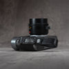 Leather Thumb Strap - Stealth attached to a Leica M, top view