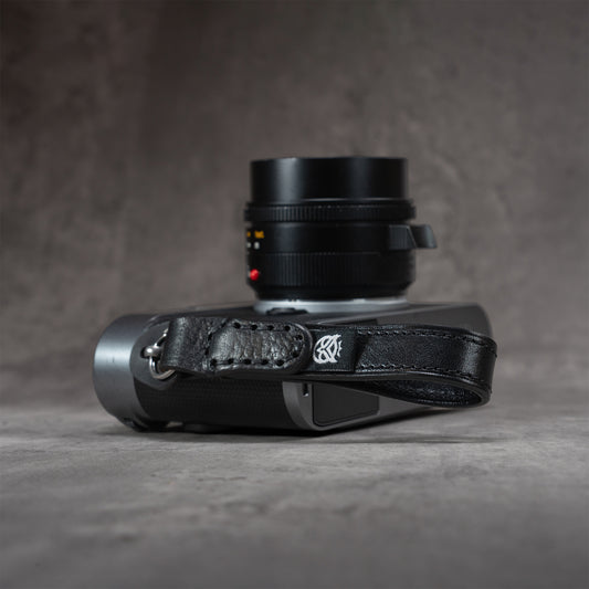 Leather Thumb Strap - Stealth attached to a Leica M, top view