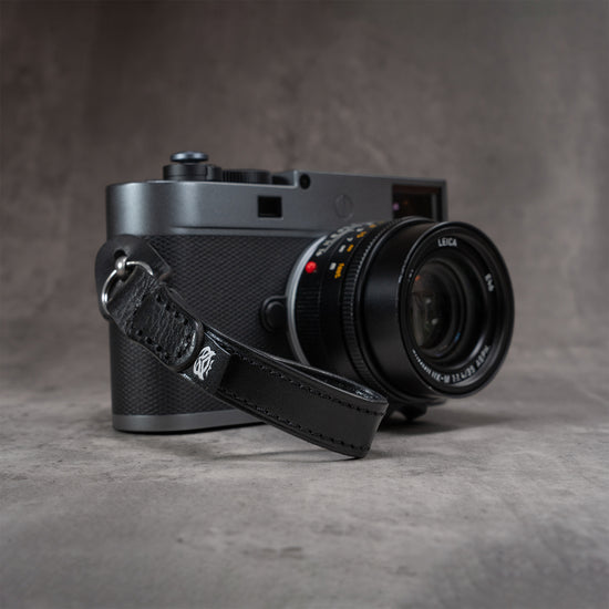 Leather Thumb Strap - Stealth on a Leica M, front view