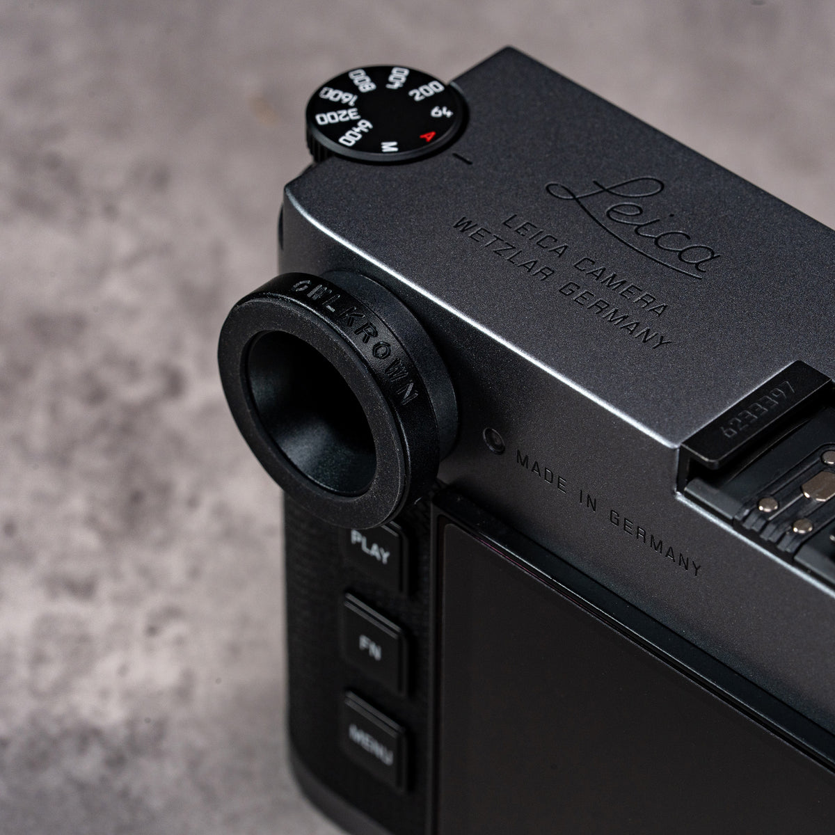 Owlkrown M-EyeKup Black Chrome on a black Leica M body, angled view from above