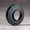 Black Chrome M-EyeKup showing the machined aluminum body and eyepiece opening