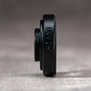 Side profile of the Owlkrown M-EyeKup in Black Chrome, machined in Miami