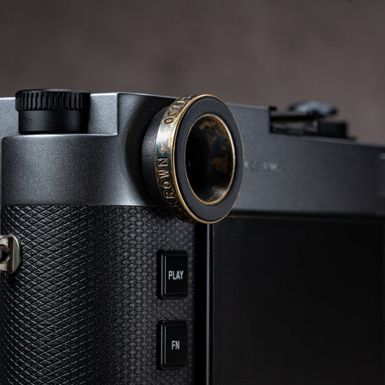 Side profile of the Black Patina M-EyeKup fitted to a Leica M rangefinder
