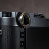 Side profile of the Black Patina M-EyeKup fitted to a Leica M rangefinder