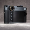 Leica M camera back fitted with the Owlkrown M-EyeKup in Black Patina