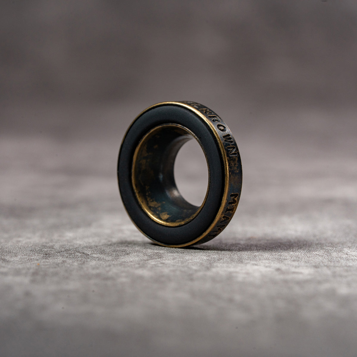 Owlkrown M-EyeKup in Black Patina, three-quarter standing view