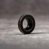 Black Patina M-EyeKup showing the aged brass body and silicone pad