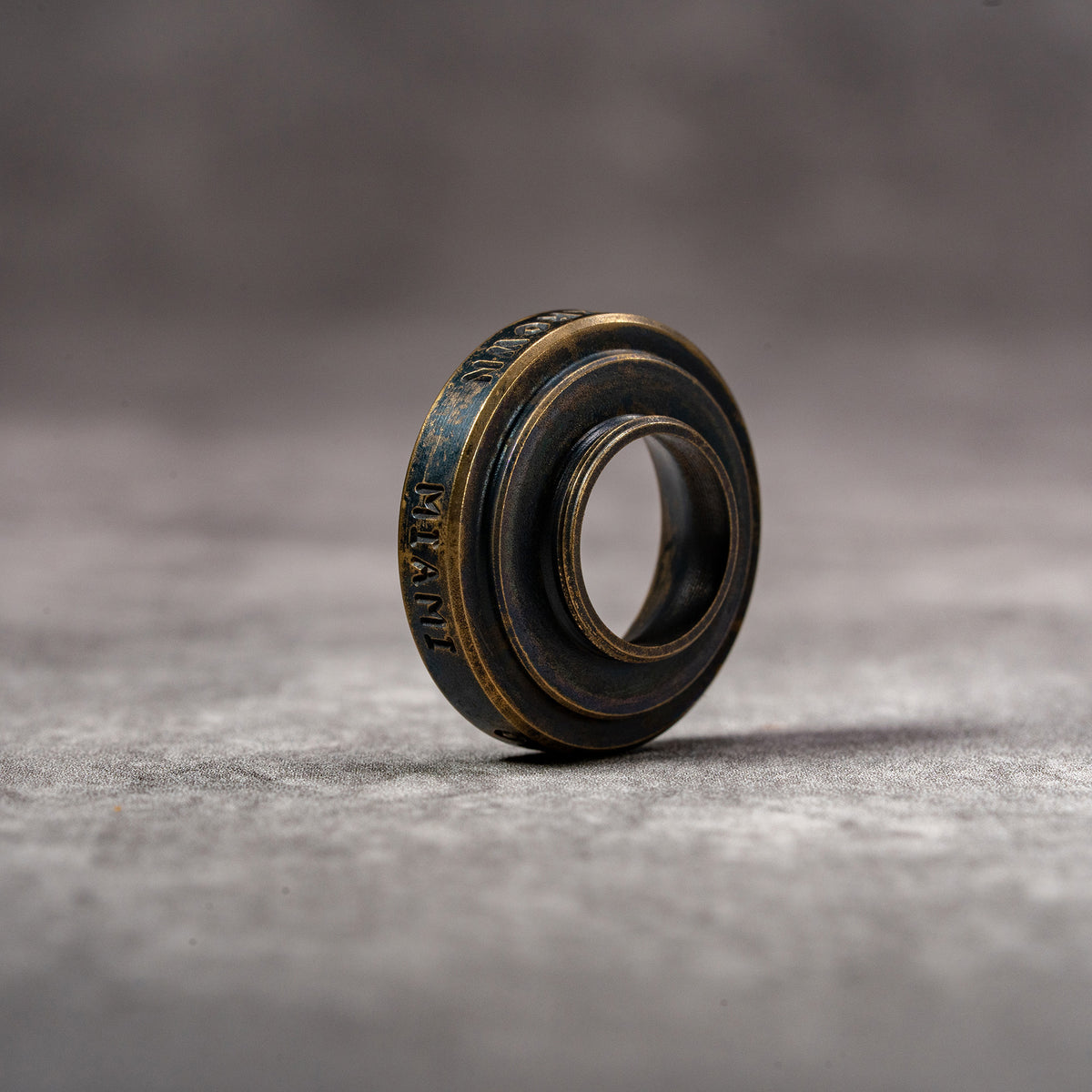 Owlkrown M-EyeKup Black Patina with the Miami engraving on the outer ring