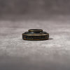 Underside of the M-EyeKup Black Patina showing the threaded barrel and Owlkrown engraving