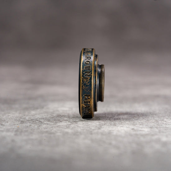 Side profile of the Owlkrown M-EyeKup in Black Patina, machined in Miami