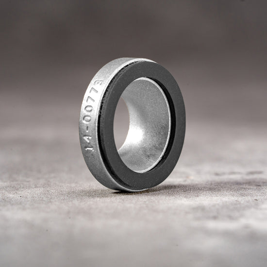 Silver Chrome M-EyeKup showing the machined aluminum body and silicone pad