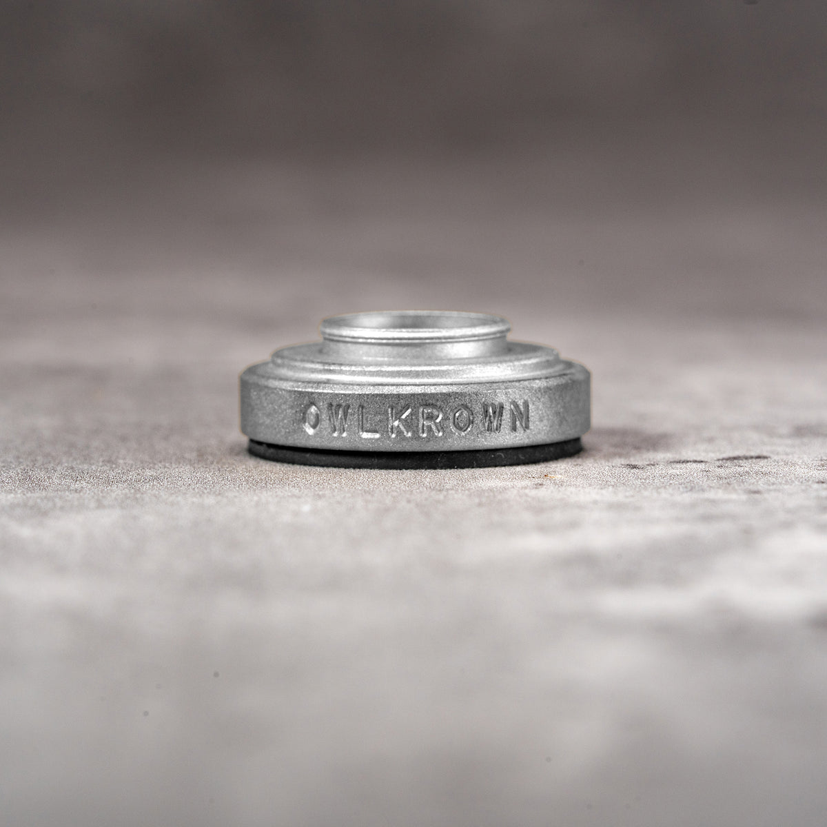 Silver Chrome M-EyeKup with the Owlkrown engraving and threaded barrel visible