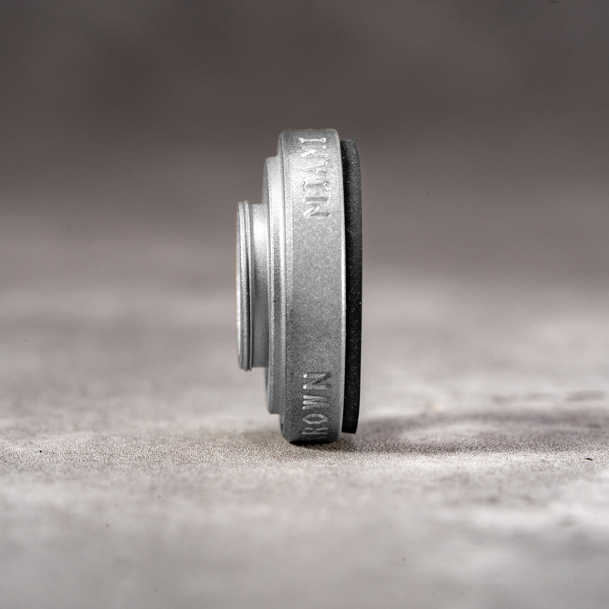 Side profile of the Owlkrown M-EyeKup in Silver Chrome, machined in Miami