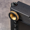 Solid Brass M-EyeKup installed on a Leica M, angled view across the top plate