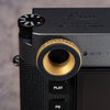 Owlkrown M-EyeKup Solid Brass on a Leica M viewfinder, top plate view