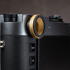 Side profile of the Solid Brass M-EyeKup fitted to a Leica M rangefinder