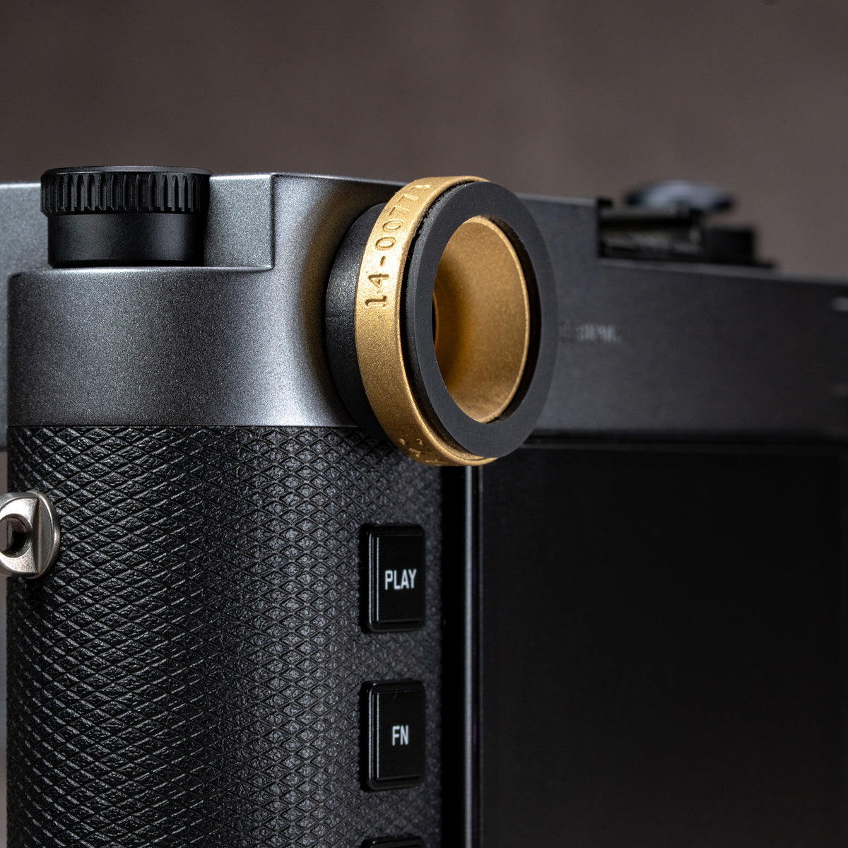 Side profile of the Solid Brass M-EyeKup fitted to a Leica M rangefinder