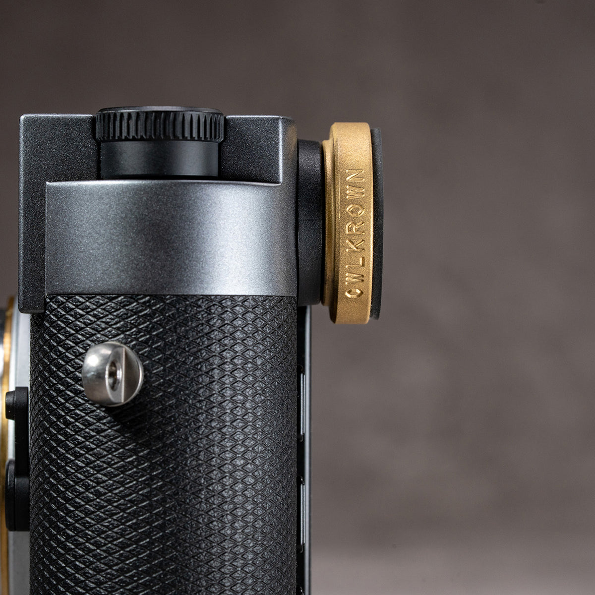 Top-down view of the M-EyeKup Solid Brass on a Leica M eyepiece