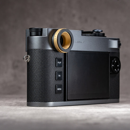 Leica M camera back fitted with the Owlkrown M-EyeKup in Solid Brass