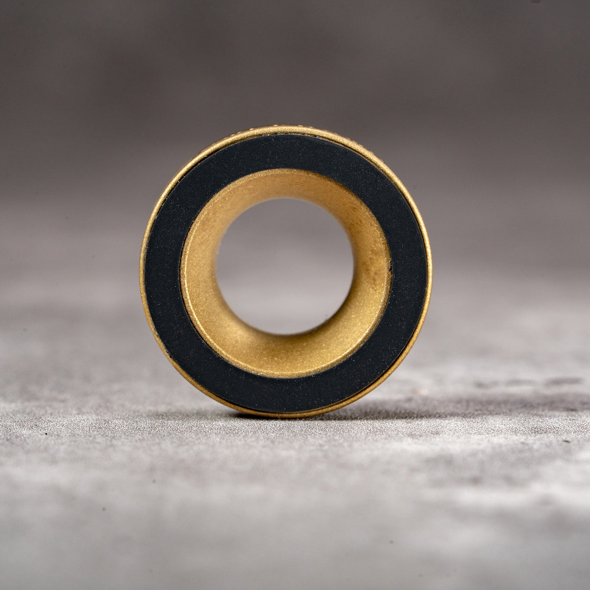 Front view of the Owlkrown M-EyeKup in Solid Brass