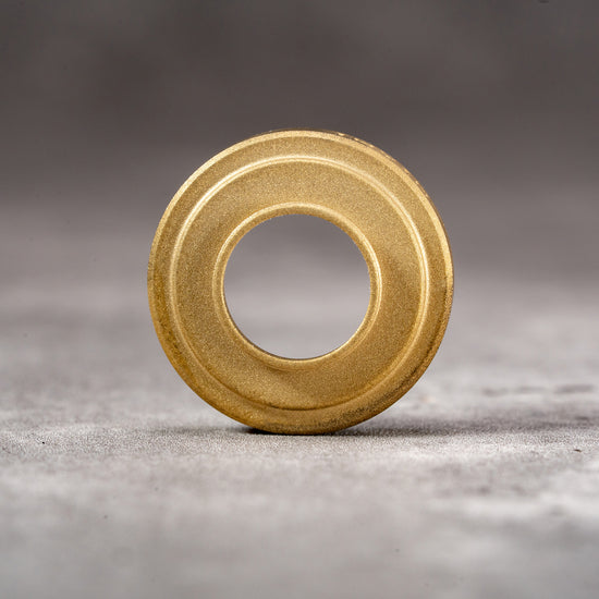 Owlkrown M-EyeKup Solid Brass viewed head on, machined face detail