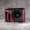 OxBlood FlexCase on a Leica Q, front view with the grip at the left of frame
