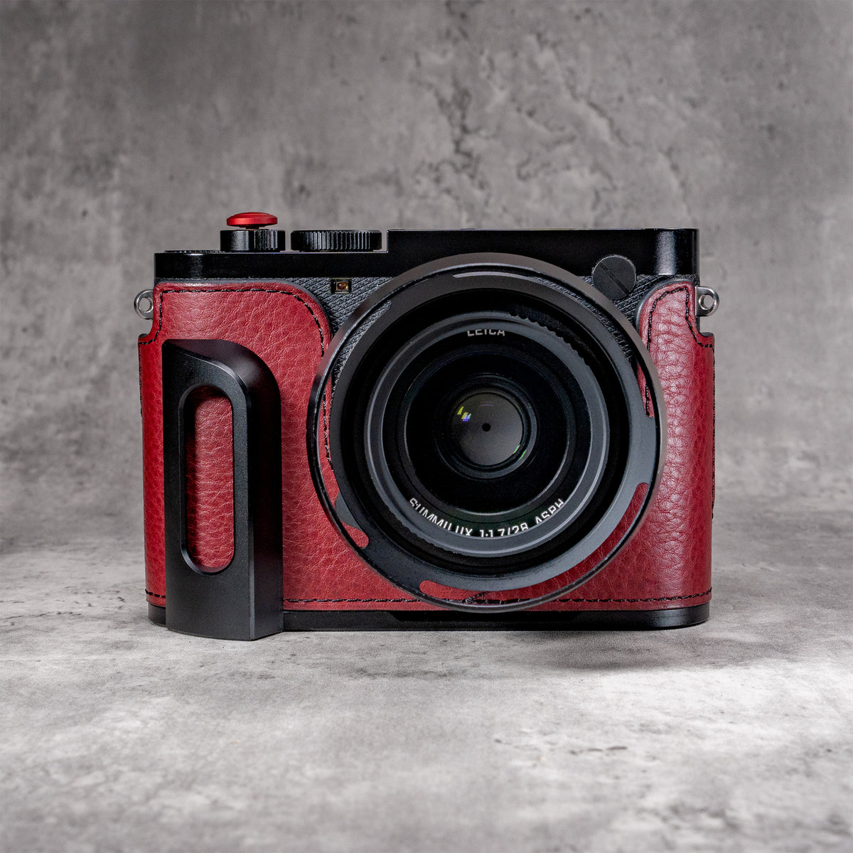 OxBlood FlexCase on a Leica Q, front view with the grip at the left of frame